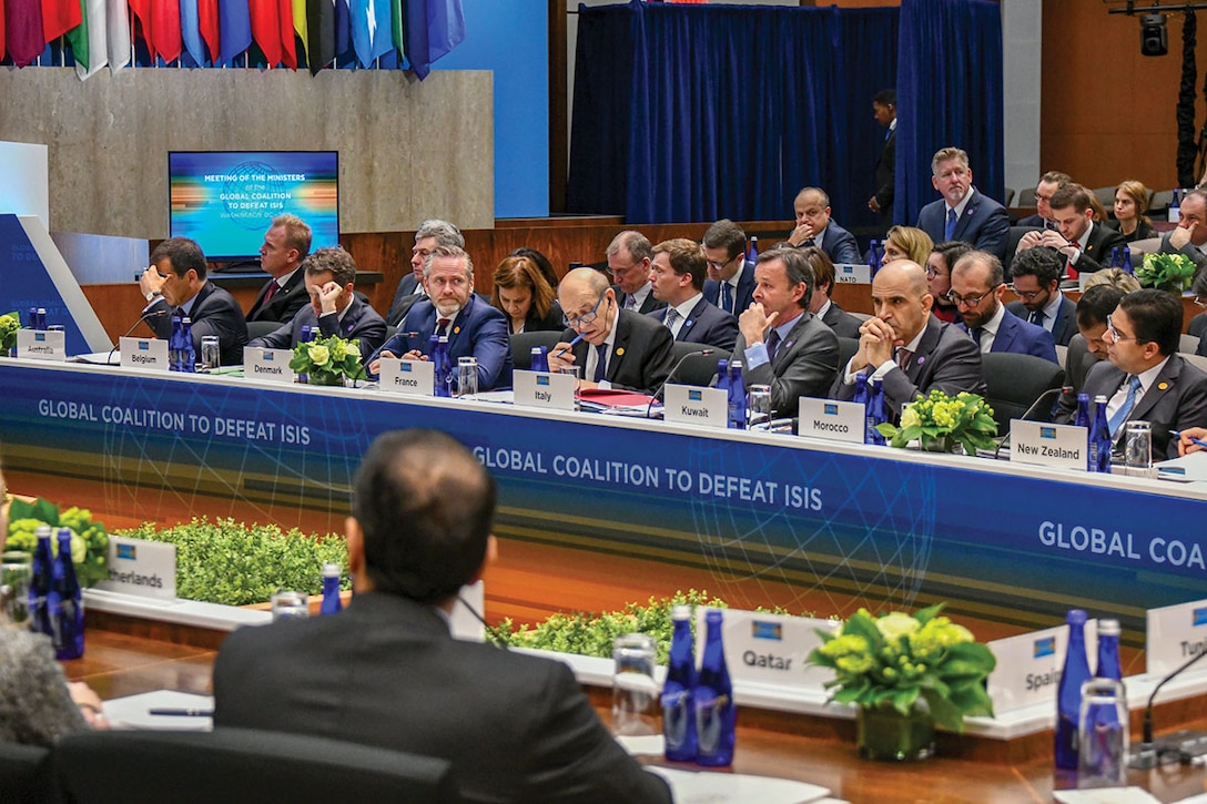In February 2019, foreign ministers listen to U.S. Secretary of State Michael R. Pompeo deliver opening remarks at the Meeting of the Ministers of the Global Coalition to Defeat ISIS. (U.S. State Department/ Ron Pryzyucha)