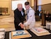 Retired Master Chief Petty Officer Charles Brent and Seaman Joshua Clark, a fireman student assigned to the Navy Nuclear Power Training Command, cut a cake during the Joint Base Charleston Navy Ball Oct. 13, 2019 at the Charleston Area Convention Center, S.C. It is tradition for the youngest and oldest Sailors in the room to cut the cake. Service members attended the ball to celebrate the Navy’s 244th birthday.