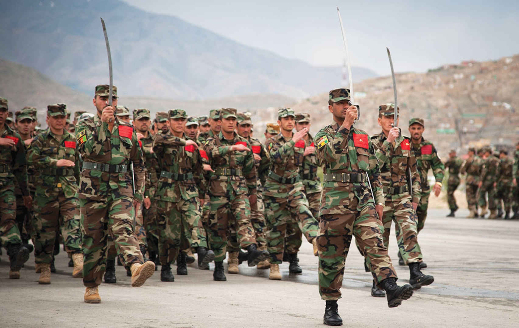 Afghan National Army (ANA) cadets practice drills on the parade grounds at the Afghan National Defense University in Kabul, Afghanistan, May 7, 2013. The university trained future ANA officers. (U.S. Air Force photo by Staff Sgt. Dustin Payne/Released)