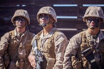 Recruits with Fox Company, 2nd Recruit Training Battalion, analyze an obstacle during the crucible at Marine Corps Base Camp Pendleton, California Oct. 2, 2019.