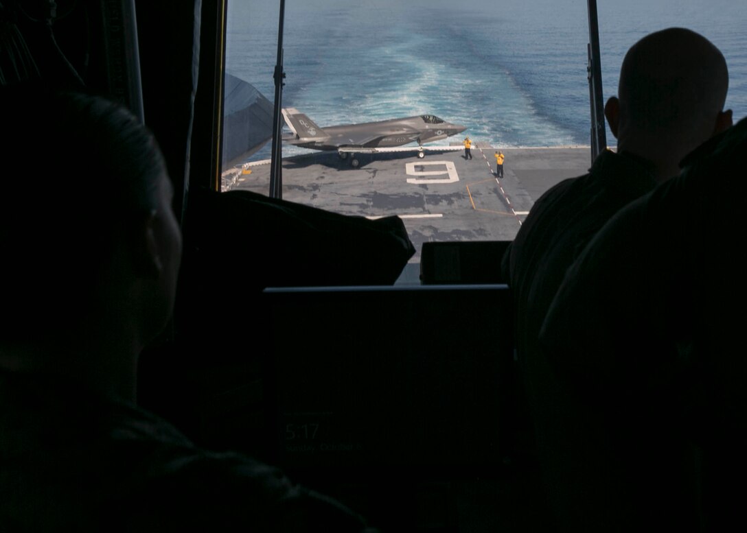 U.S. Marine Corps senior leadership with Marine Fighter Attack Squadron (VMFA) 122, Marine Aircraft Group 13, 3rd Marine Aircraft Wing (MAW), observe an F-35B Lightning II taxiing on the flight deck aboard the amphibious assault ship USS America (LHA 6) in the eastern Pacific, Oct. 6, 2019. 3rd MAW is capable of conducting missions across the range of military operations and continues to promote the defense of our nation and its interests. (U.S. Marine Corps photo by Lance Cpl. Juan Anaya)