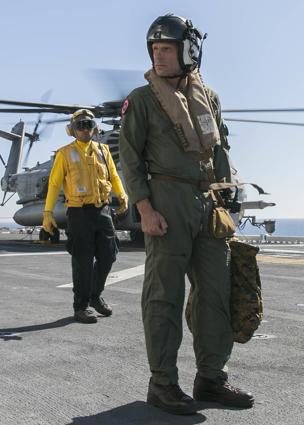 U.S. Marine Corps Maj. Gen. Kevin M. Iiams, commanding general of 3rd Marine Aircraft Wing (MAW), prepares to depart after his visit to the amphibious assault ship USS America (LHA 6) in the Eastern Pacific, Oct. 6, 2019. Integrating 3rd MAW’s combat power and capabilities while conducting realistic training is essential to generate readiness and lethality in our units. (U.S. Marine Corps photo by Lance Cpl. Juan Anaya)