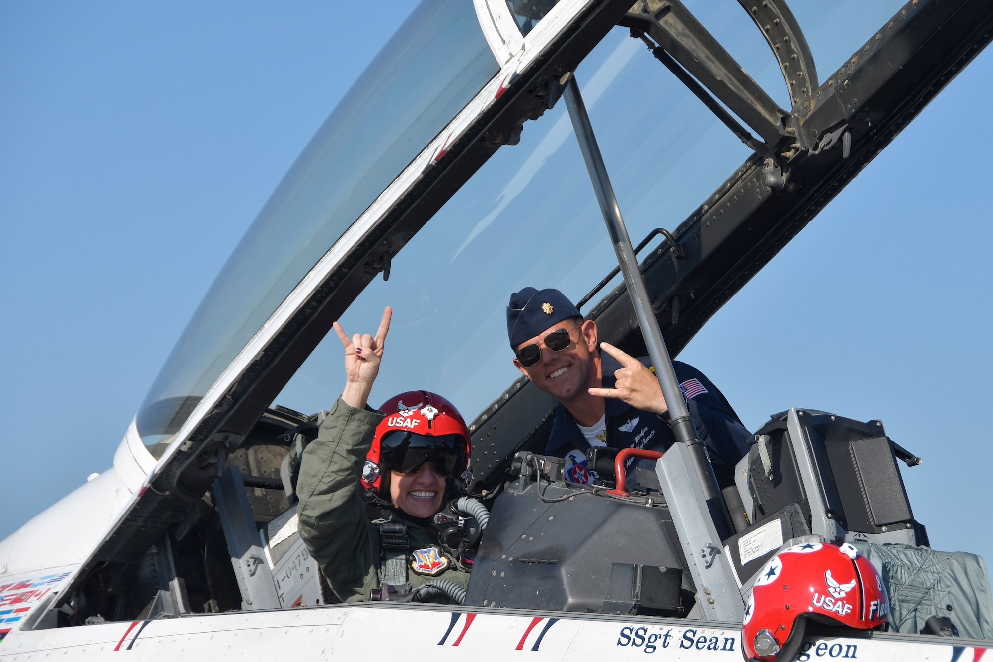 Tracey Pendley, an Atlanta Public Schools fourth grade teacher, left, and Maj. Jason Markzon, Thunderbirds advance pilot and narrator, pose for a photo shortly before takeoff at Dobbins Air Reserve Base, Ga. on Oct. 11, 2019. Tracey Pendley, this year's Georgia Teacher of the Year and Hometown Hero, flew with the Thunderbirds. (U.S. Air Force photo/Airman Kendra A. Ransum)