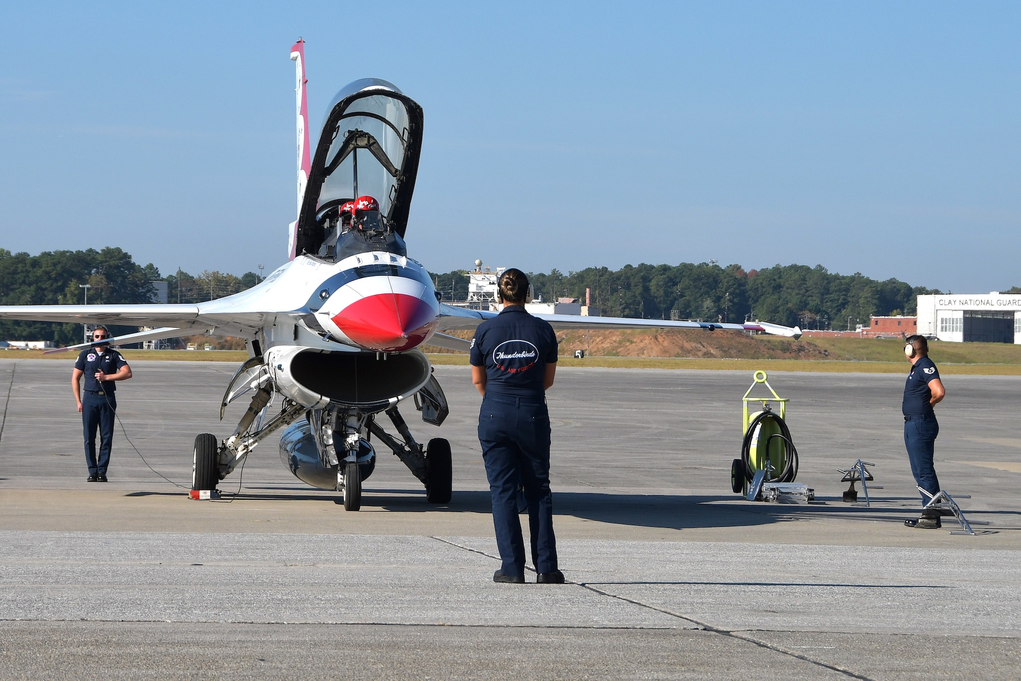U.S. Air Force Thunderbirds aircrew conduct pre-flight checks at Dobbins Air Reserve Base, Ga. on Oct. 11, 2019. Tracey Pendley, this year's Georgia Teacher of the Year and Hometown Hero, flew with the Thunderbirds. (U.S. Air Force photo/Airman Kendra A. Ransum)