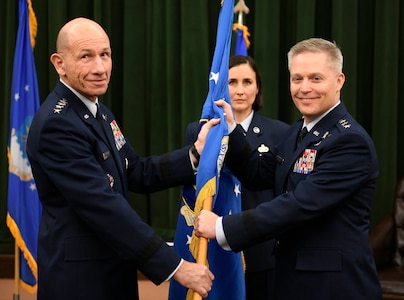 Lt. Gen. Timothy Haugh (right) assumes command of Sixteenth Air Force from Gen. Mike Holmes, Air Combat Command commander, during the Sixteenth Air Force assumption of command at Joint Base San Antonio-Lackland Oct. 11. The Twenty-Fourth and Twenty-Fifth Air Forces were inactivated during the ceremony to integrate into the new information warfare numbered air force. Sixteenth Air Force is responsible for providing information warfare capabilities to combatant commanders with the speed to match today’s technological environment.
