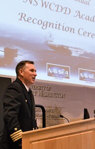 IMAGE: Capt. Casey Plew, Naval Surface Warfare Center Dahlgren Division (NSWCDD) commanding officer, welcomes academic awardees along with their families, friends, and colleagues to the 2019 NSWCDD academic recognition ceremony held at the University of Mary Washington Dahlgren campus. Plew praised the awardees for successfully taking on the challenges of balancing work and family responsibilities with academics to obtain certifications or degrees. He also commended the families, friends, and colleagues who supported NSWCDD employees in their pursuit and achievement of the milestones for which they have been recognized.