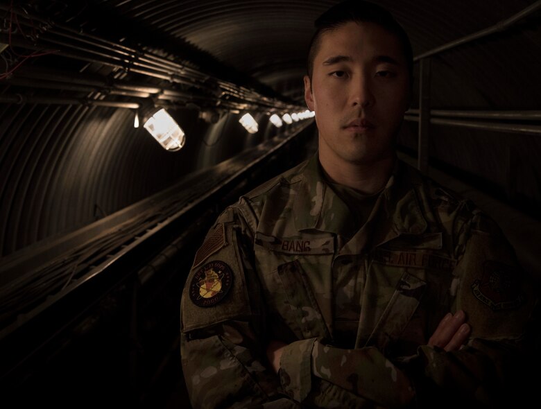 Capt. John Bang, 23rd Space Operations Squadron detachment 1 commander, stands in a tunnel leading to a radar at Thule Air Base, Greenland, Oct. 9, 2019. The United States and its allies utilize Det. 1’s capabilities for navigation, research and development, weather, warning, intelligence and satellite communication missions. (U.S. Air Force photo by Airman 1st Class Jonathan Whitely)