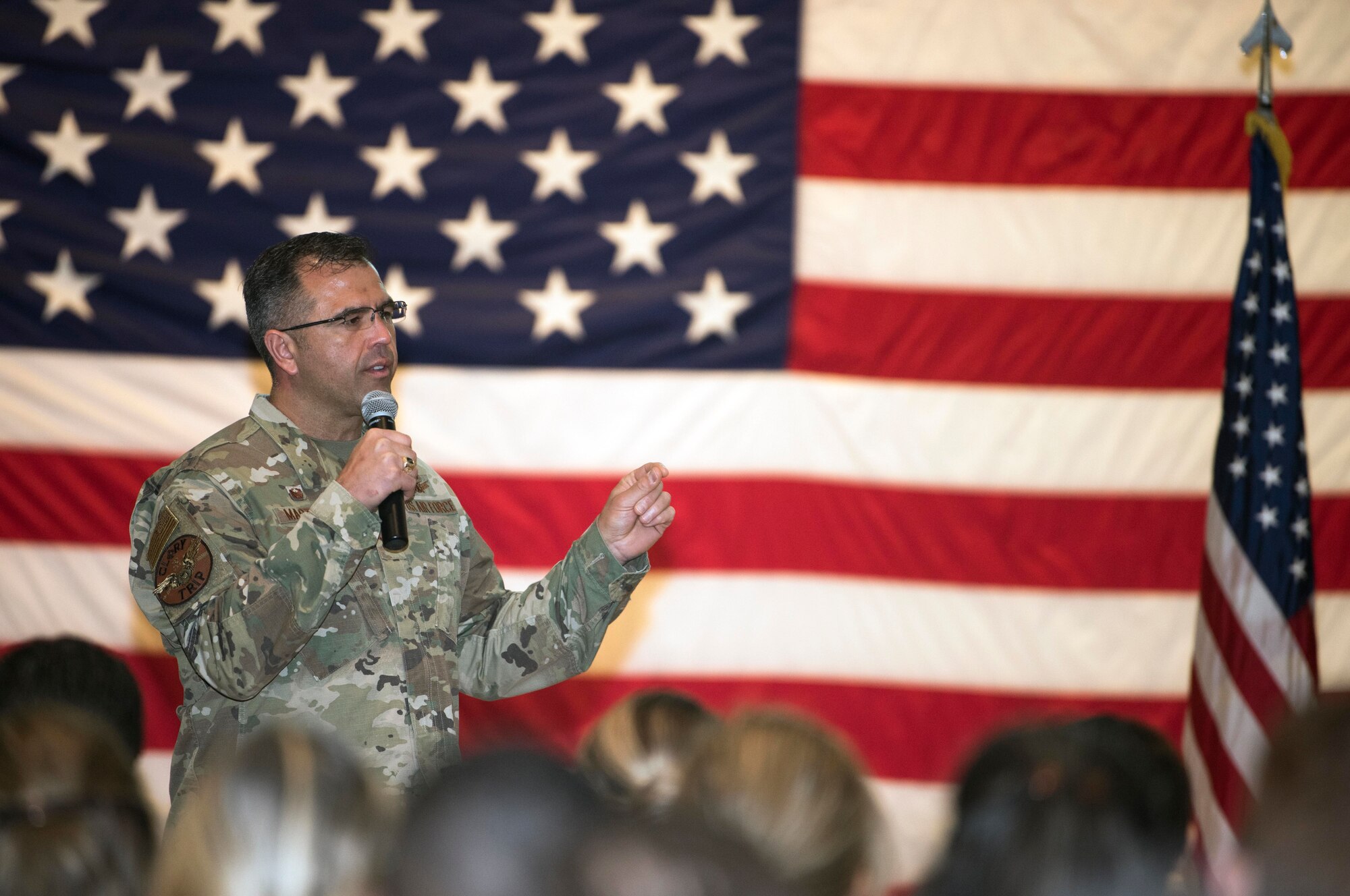 Col. Anthony Mastalir, 30th Space Wing Commander, speaks during his first all-call Oct. 15, 2019, at Vandenberg Air Force Base, Calif. Mastalir spoke about base-wide changes, upcoming events and ongoing developments to build the Range of the Future. (U.S. Air Force photo by Airman 1st Class Hanah Abercrombie)