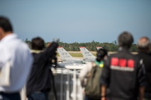 Local Komatsu media outlets take photos of various U.S. Air Force F-16 Fighting Falcons during an aviation training relocation at Komatsu Air Base, Japan, Oct. 1, 2019. Mainichi, Hokuriku Chunichi, Hokko Ku and other local press representatives attended the bilateral training to photograph and film incoming F-16s increasing the visibility and knowledge of the week-long exercise. The F-16s are assigned to the 35th Aircraft Maintenance Unit at Misawa AB, Japan. (U.S. Air Force photo by Senior Airman Collette Brooks)