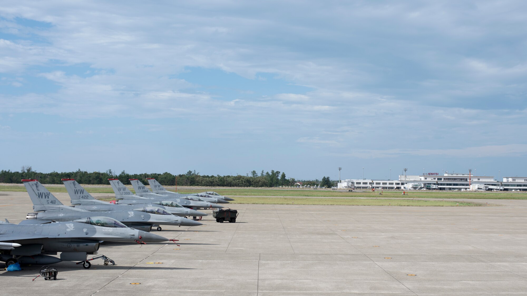 Six U.S. Air Force F-16 Fighting Falcons sit on the flight line during an aviation training relocation at Komatsu Air Base, Japan, Oct. 3, 2019. The ATR promoted cross training with host nation counterparts to minimize the gap of F-16 knowledge with Japan Air Self-Defense Force Airmen, while maximizing tactical strength, friendship and alliance. The F-16s are assigned to the 35th Fighter Wing at Misawa AB, Japan. (U.S. Air Force photo by Senior Airman Collette Brooks)