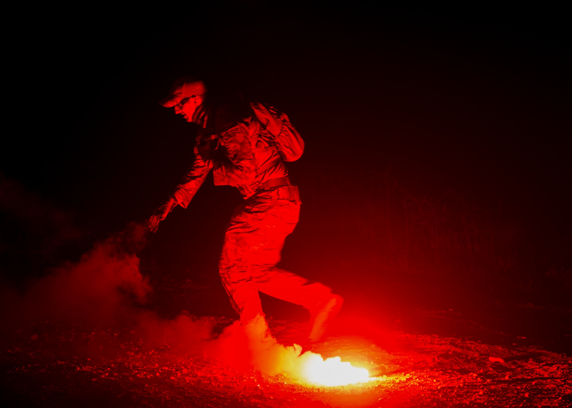 Staff Sgt. David Chorpeninng, 366th Fighter Wing survival, evasion, resistance and escape specialist, pops the illumination end of a MK-124 marine smoke and illumination signal Sept. 26, 2019, at Saylor Creek Bombing Range, Idaho.