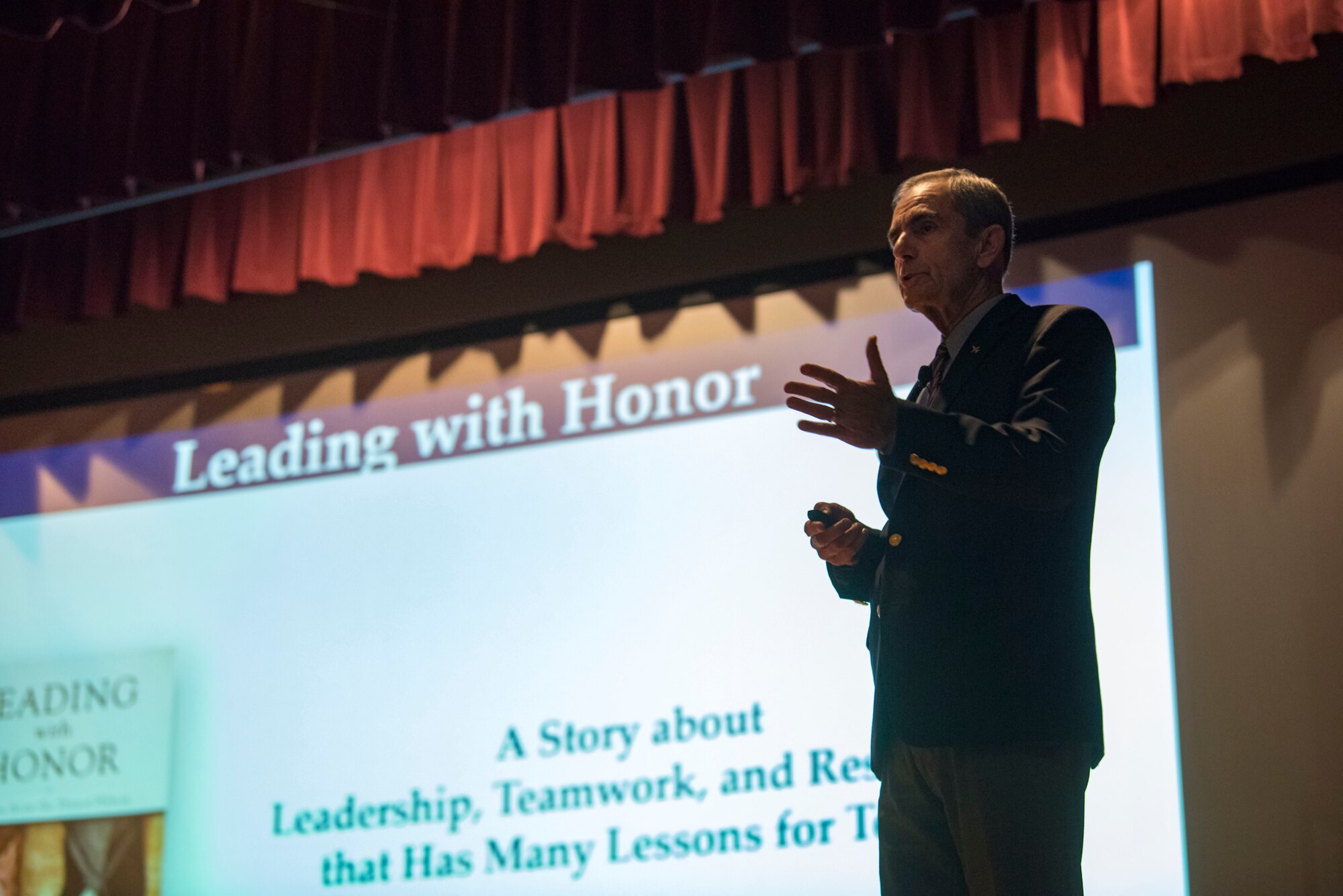 Retired Col. Lee Ellis, Vietnam War F-4 Phantom pilot and author of “Leading with Honor,” shares his experiences as a prisoner of war during the Vietnam War with members of Team Fairchild in the base theater at Fairchild Air Force Base, Washington, Oct. 8, 2019. Ellis visited Fairchild to share his experiences from being a POW, and to speak on the qualities of what makes a good leader as part of the monthly Fairchild Speaker Series. (U.S. Air Force photo by Airman 1st Class Lawrence Sena)