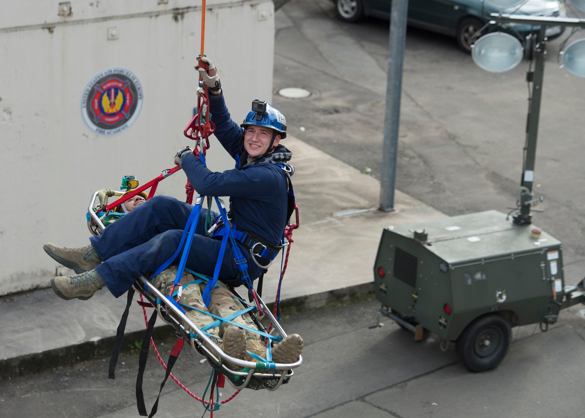 Airman 1st Class Trevor Farber, a firefighter from the 86th Civil Engineer Squadron, sits suspended in the air on a highline during a Rescue Technician I Course near Ramstein Air Base, Germany, Oct. 11, 2019. The highline maneuver is important for firefighters to learn in the event they would need to save people in difficult-to-reach places, like canyons.