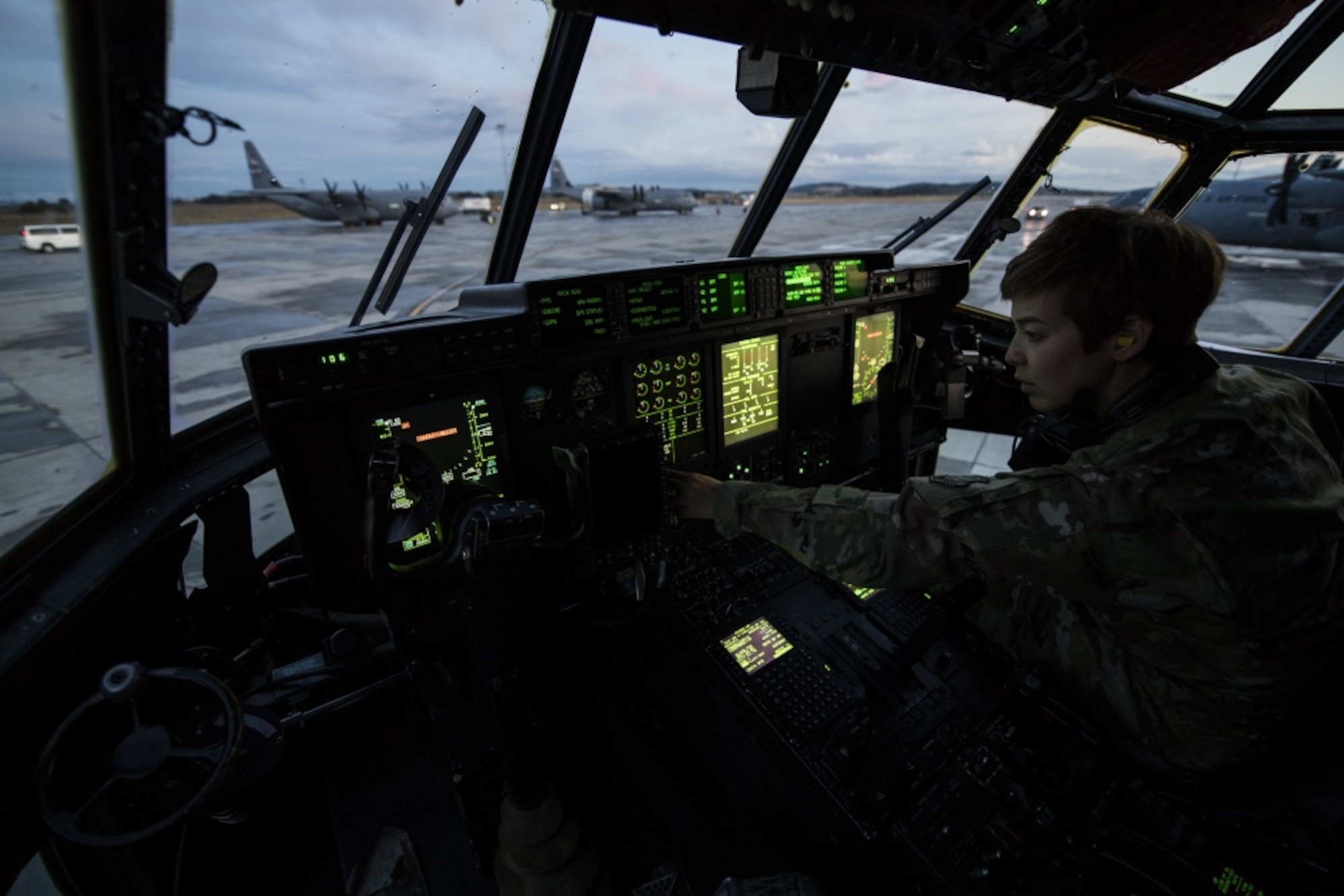 A woman is in a C-130J.