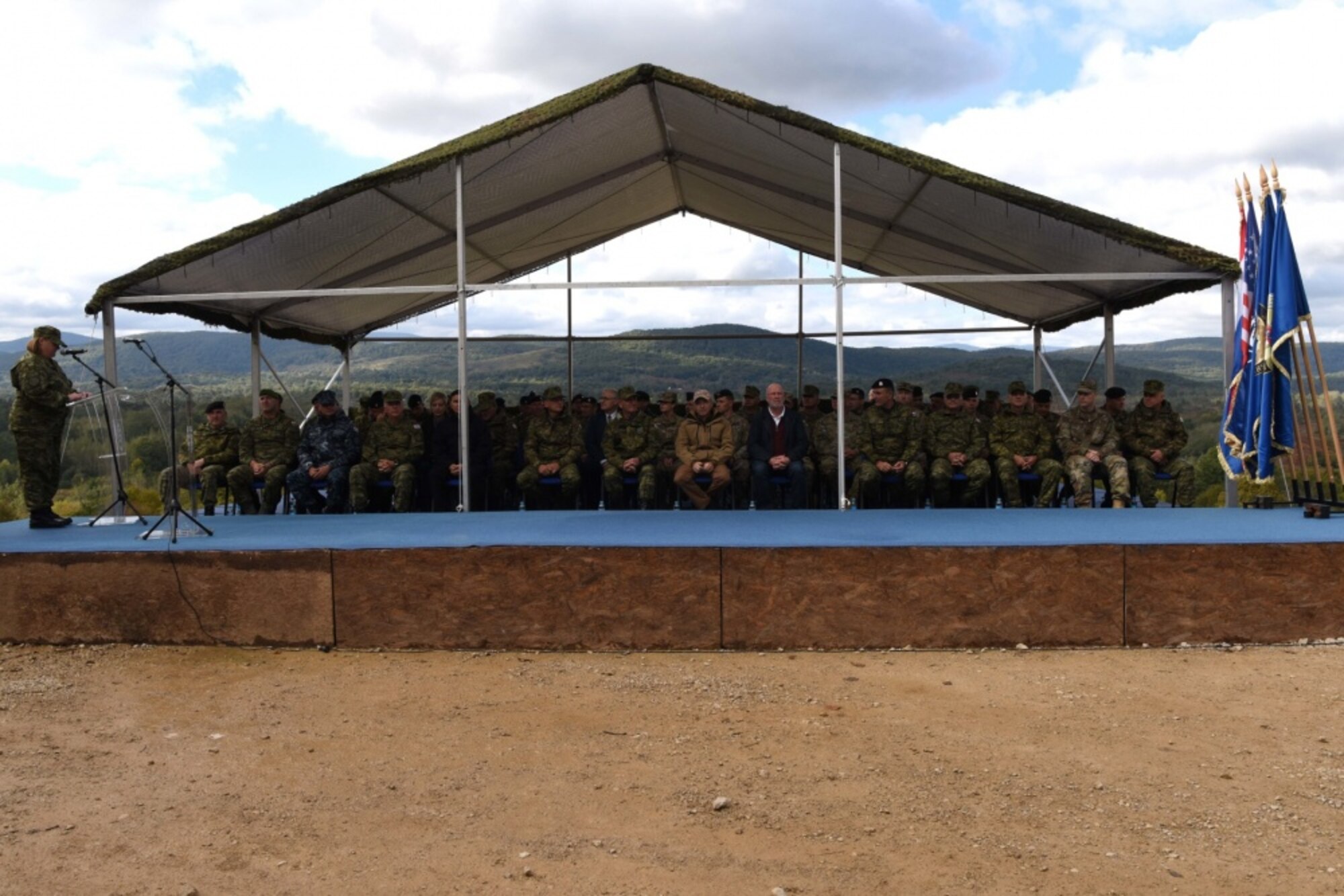 Robert Kohorst, U.S. ambassador to Croatia, sits with Croatia Minister of Defense and Croatian military forces, during the grand opening of a range observation tower ceremony at Slunj Training Area, Croatia, Oct. 4, 2019. To honor the new construction project several Croatian military members in attendance as well as Croatia’s minister of defense, army commander and chief of general staff. (U.S. photo by Senior Airman Milton Hamilton)