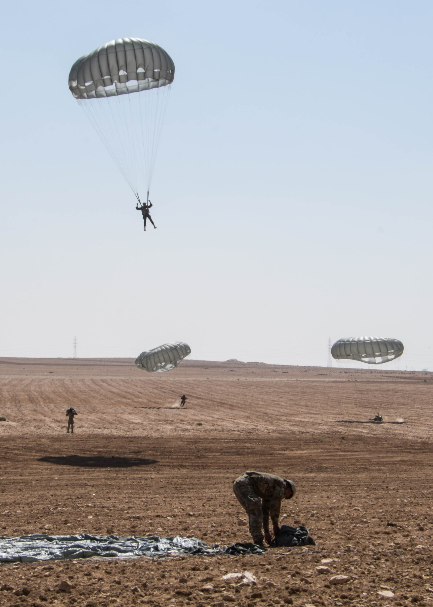 Participants in the Friendship Jump during Exercise Eager Lion parachute to the ground in Jordan on Sept. 5, 2019.