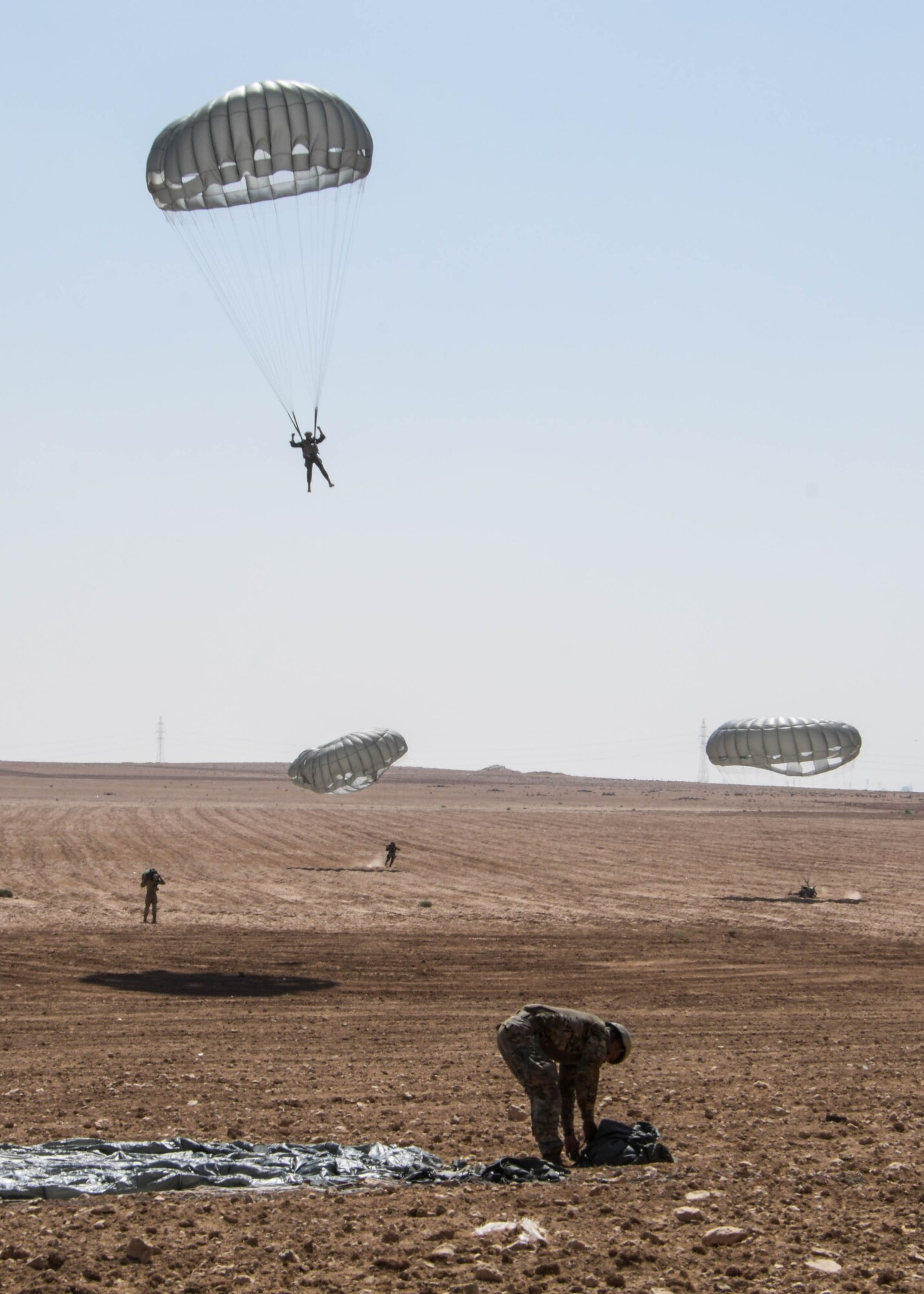 Participants in the Friendship Jump during Exercise Eager Lion parachute to the ground in Jordan on Sept. 5, 2019.