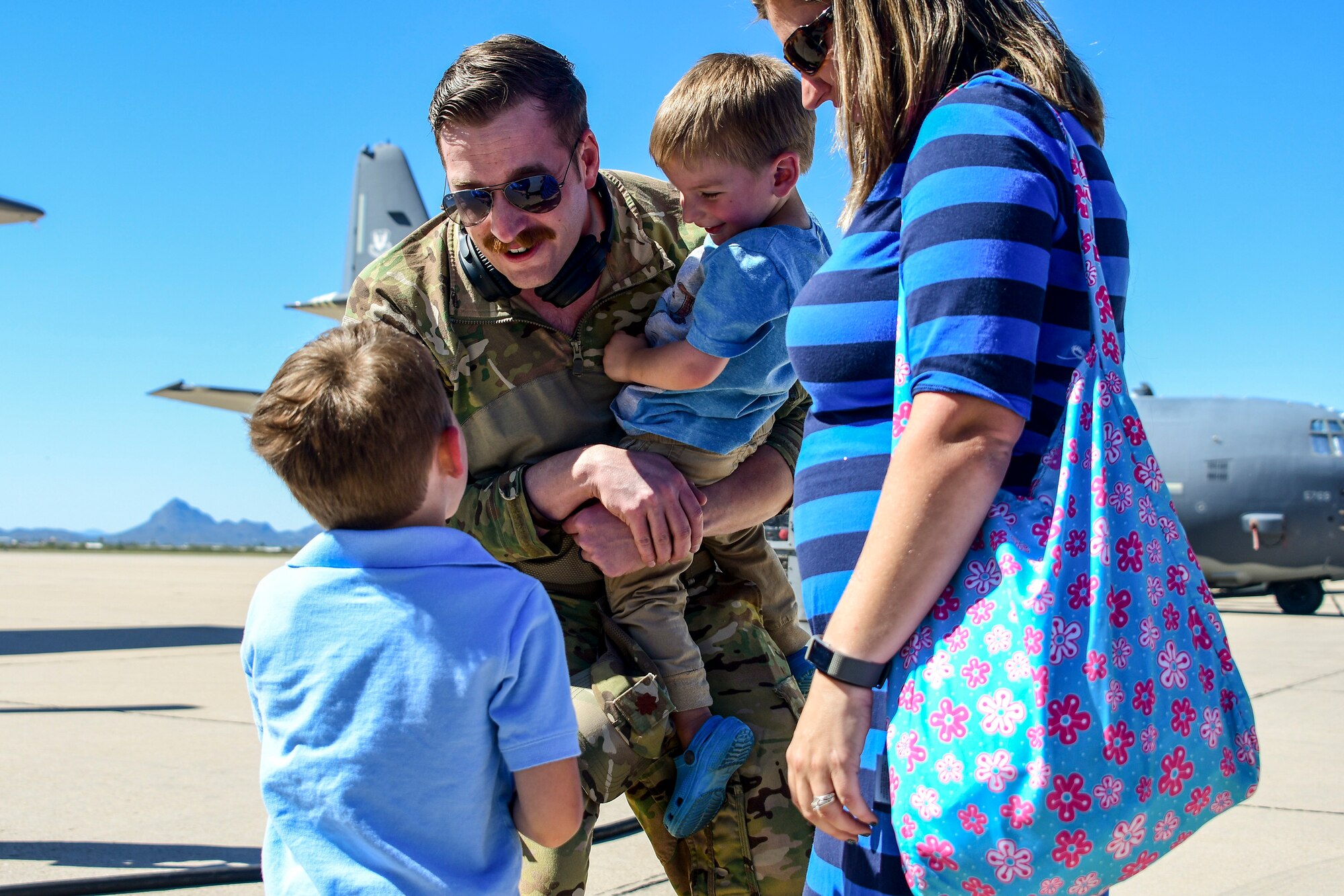 Airmen assigned to the 79th Rescue and 655th Aircraft Maintenance Squadrons are welcomed home by family and friends at Davis-Monthan Air Force Base, Arizona, Oct. 13, 2019. The Airmen were deployed supporting our mission abroad. (U.S. Air Force photo by Senior Airman Kristine Legate)