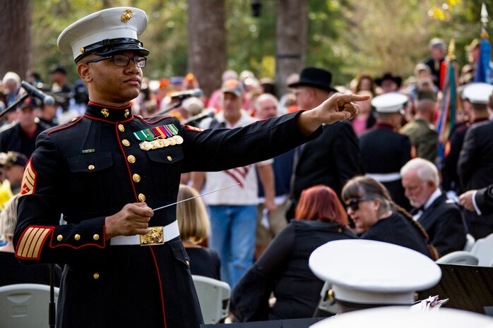U.S. Marine Corps Staff Sgt. Alan Phillips, musician, 2nd Marine Division, directs the 2nd Marine Division Band at the 35th Beirut Memorial Observance Ceremony at the Lejeune Memorial Gardens in Jacksonville, N.C., Oct. 23, 2018. A memorial observance is held on Oct. 23 of each year to remember those lives lost during the terrorist attacks at U.S. Marine Barracks, Beirut, Lebanon and Grenada.