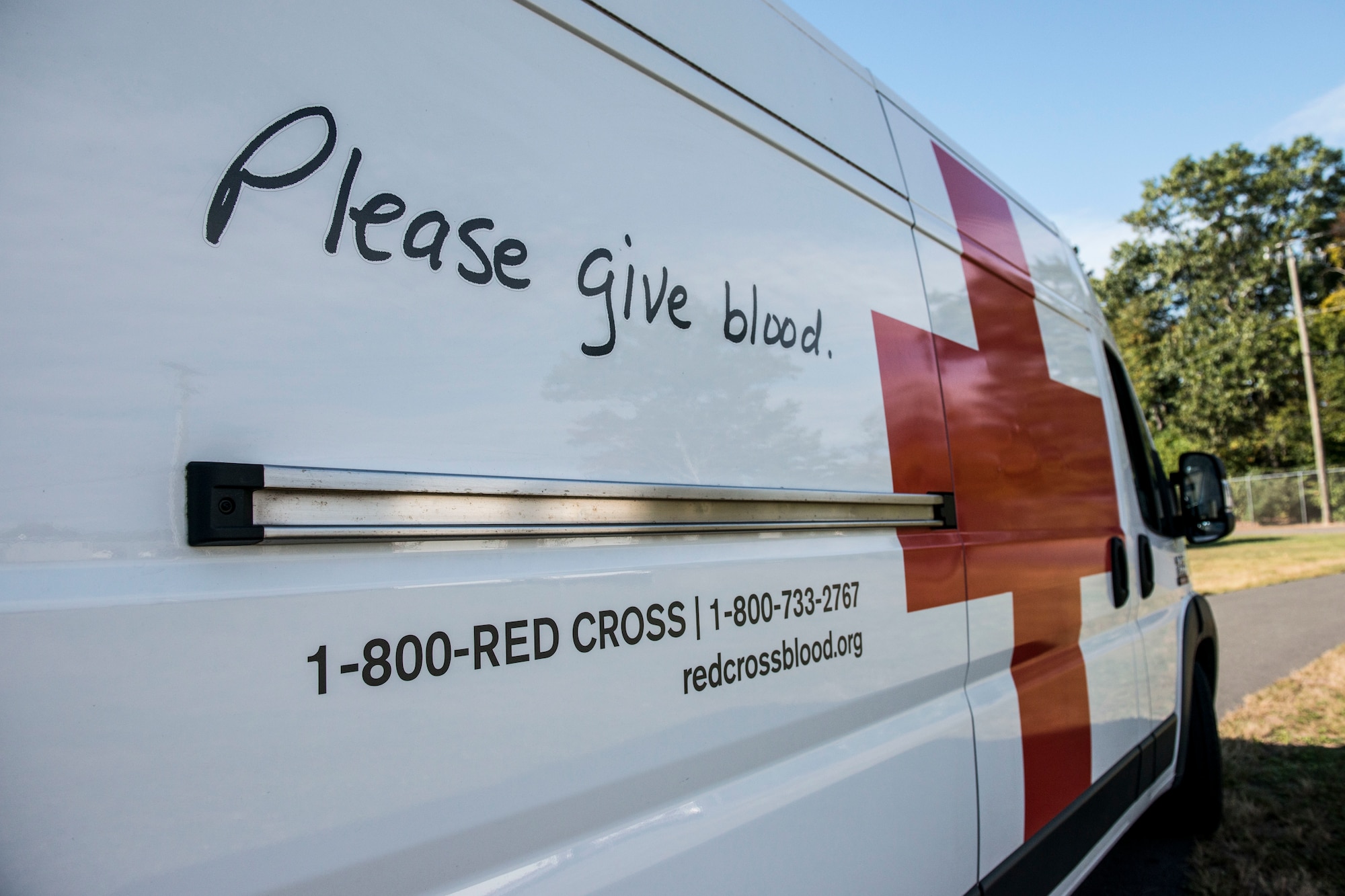 An American Red Cross van parked outside of a blood donation station, September 26, 2019 at Bradley Air National Guard Base, East Granby, Conn. Members of the 103rd Airlift Wing partnered with the American Red Cross to donate 44 pints of blood during a blood drive. (U.S. Air National Guard photo by Tech. Sgt. Tamara R. Dabney)