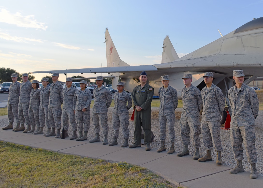 U.S. Air Force Airman 1st Class Noah Sharp, a recent linguist graduate waits with his class to graduate from the Defense Linguist Course at Goodfellow Air Force Base, Texas, Sept. 11, 2019. These skilled professionals have learned to transcribe, translate, and summarize intercepted voice and graphic communications. (U.S. Air Force photo by Airman 1st Class Ethan Sherwood/Released)