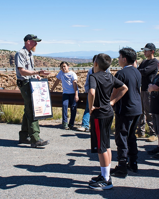 USACE-Albuquerque District park ranger Austin Kuhlman, far left, explains where the water in Abiquiu Lake comes from to students from Coronado High School and Middle School during their tour of Abiquiu Dam, Oct. 3, 2019.