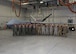 Airmen with the 20th Attack Squadron pose for a group photo in front of an MQ-9 Reaper, at Whiteman Air Force Base, Missouri, June 17, 2019. The 20th ATKS is a geographically separated unit that falls under the 432nd Wing/432nd Air Expeditionary Wing and supports combatant commanders in operations abroad. (U.S. Air Force photo by Airman 1st Class Parker J. McCauley)