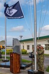 Seabees assigned to Naval Mobile Construction Battalion , raise the battalion colors during the transfer of authority ceremony where NMCB 4 was relieved by NMCB 5.