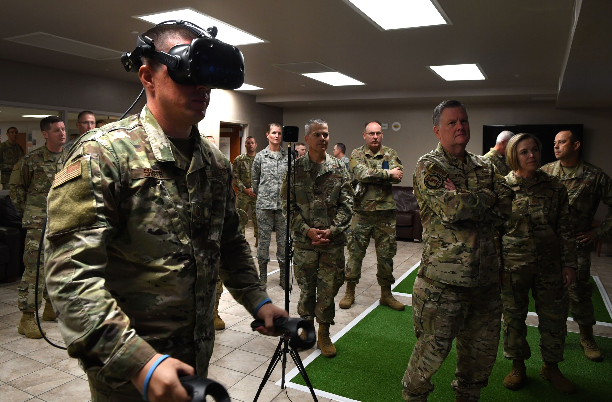 U.S. Air Force Master Sgt. Matthew Shaffer, Department of Defense biomedical equipment technician training program instructor supervisor, demonstrates a virtual reality training program to Air Education and Training Command leadership during an immersion tour at Joint Base San Antonio-Fort Sam Houston, Texas, Oct. 9, 2019. An innovation team on the Medical Education Training Campus has created a VR lab to augment learning within each student’s respective schoolhouse. (U.S. Air Force photo by Staff Sgt. Amanda Stanford)