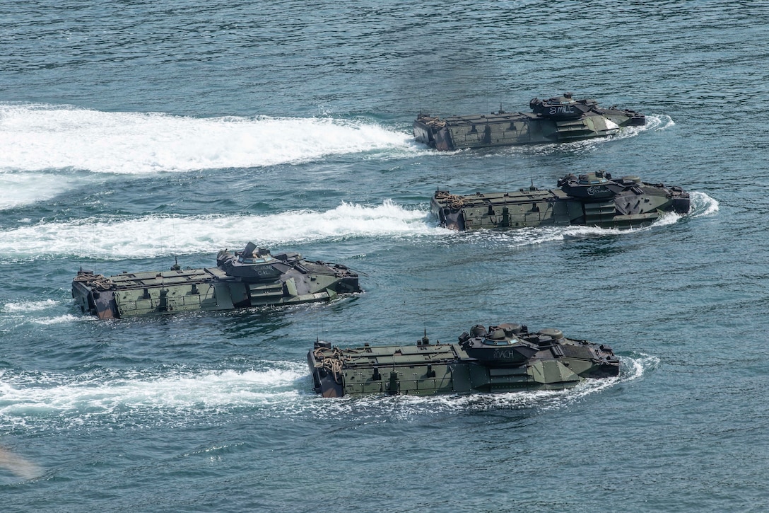 Assault amphibious vehicles participate in an amphibious landing during exercise KAMANDAG 3 at Marine Base Gregorio Lim, Ternate, Philippines, Oct. 12, 2019. KAMANDAG helps participating forces maintain a high level of readiness and responsiveness, and enhances combined military-to-military relations, interoperability, and multinational coordination. (U.S. Marine Corps photo by Cpl. Dalton S. Swanbeck)