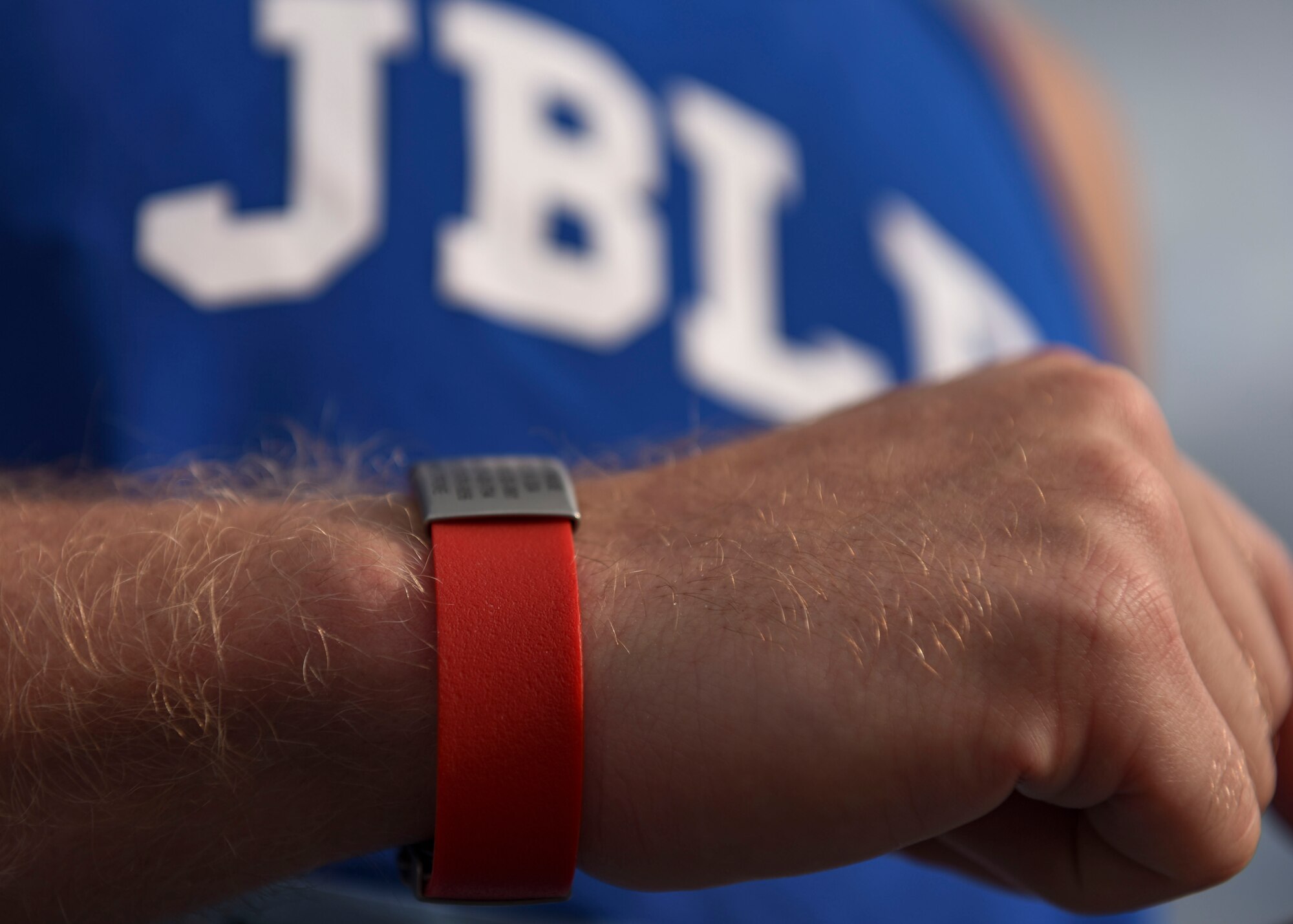 U.S. Army Sgt. 1st Class Nick Krause, Alpha Company, 2nd Battalion, 210th Aviation Regiment, 128th Aviation Brigade CH-47 helicopter repairer instructor writer, wears an emergency contact bracelet during the 35th annual Army Ten-Miler race in Washington D.C., Oct. 13, 2019.