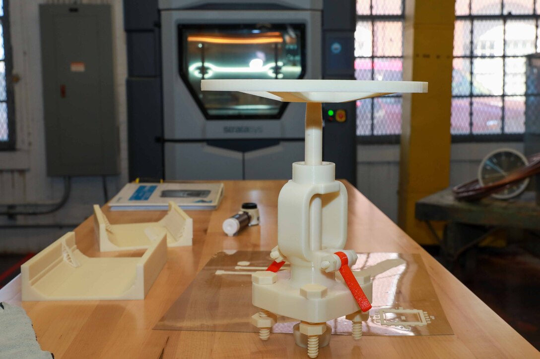The Technology and Innovation Lab’s Research and Development Team works in additive manufacturing to expand the technological advances of Norfolk Naval Shipyard. Additive Manufacturing Subcommittee Lead Jessica Roberts said, “In order to best explore the new technologies we have access to, it’s important to put forward the research and explore ideas of what AM is best suited for here at the yard. We test the limits of 3D printing technologies and build on ideas from our workforce within the Lab. And once we have a firm grasp on what the technology is capable of, we put it into the hands of the employees so we can continue to research the latest technologies available to us.”