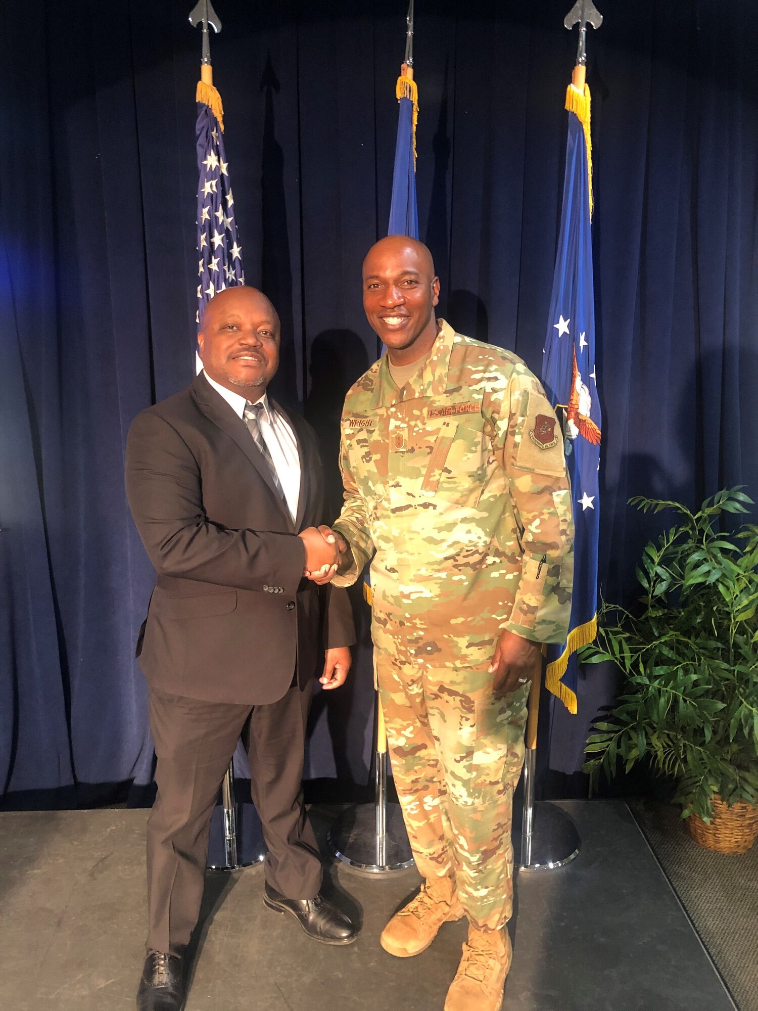 Chief Master Sgt. of the Air Force Kaleth O. Wright shakes hands with Tommy Mcinnis, 61st Air Base Group Equal Opportunity director, Los Angeles Air Force Base, Calif., Sept. 26, 2019. While visiting Los Angeles AFB, he met with Airmen, received Space and Missile Systems Center mission area briefings, and had an opportunity to view the unique characteristic of SMC and the capabilities that the total force offers to accomplish the mission.

(Courtesy photo)