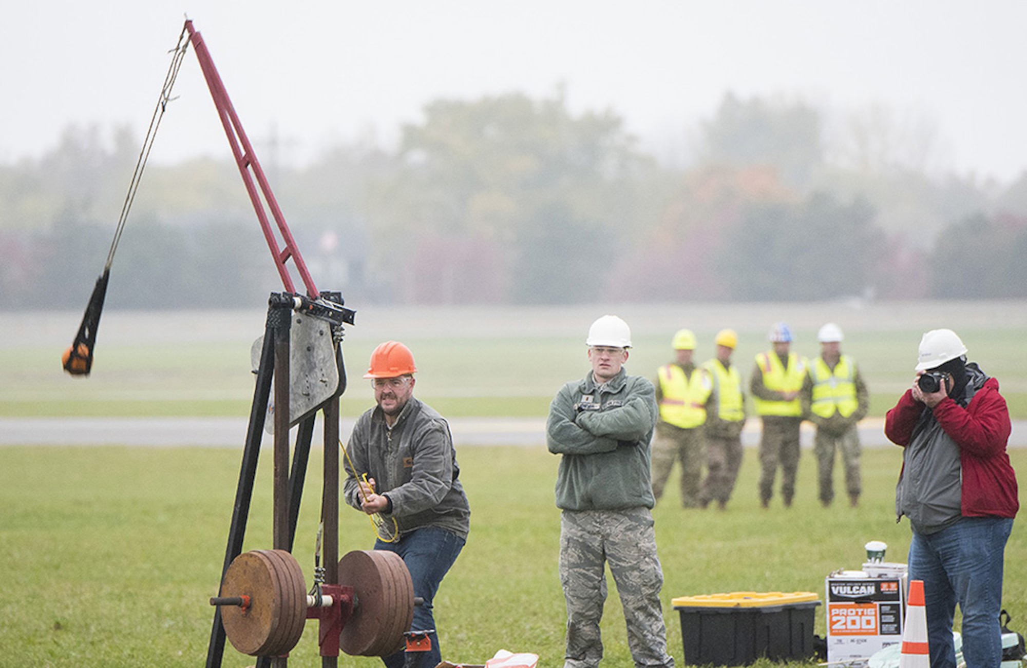 A team readies their machine to hurl a pumpkin into the air, competing for the longest distance in the Air Force Life Cycle Management Center's Pumpkin Chuck competition. Teams compete in three categories, which vary in size of machine, weight of pumpkin, and Human-powered.(Courtesy photo)