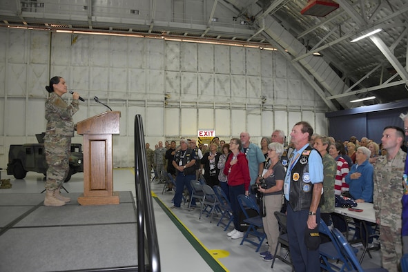 Vietnam Security Police Association members, their family members and Joint Base Andrews Airmen stand for the singing of “The Star-Spangled Banner” at Joint Base Andrews, Md., Oct. 10, 2019. The VSPA visited the Vietnam Veterans Memorial and JBA as they celebrated their 25th anniversary. (U.S. Air Force photo by Airman 1st Class Spencer Slocum)