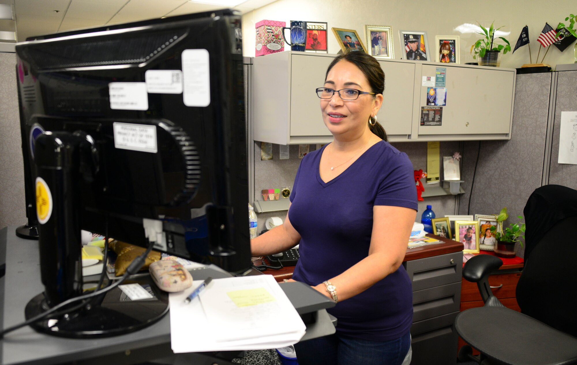 Mario Lugo with the 377th Comptroller Squadron, works to help close out the 2019 fiscal year at the Consolidated Support Building, Sept. 30, 2019. Comptrollers, contractors and resource advisors had to work double-time with any end-of-year funds, finalizing transactions to acquire the goods and services before the closeout.  (U.S. Air Force photo by Jessie Perkins)