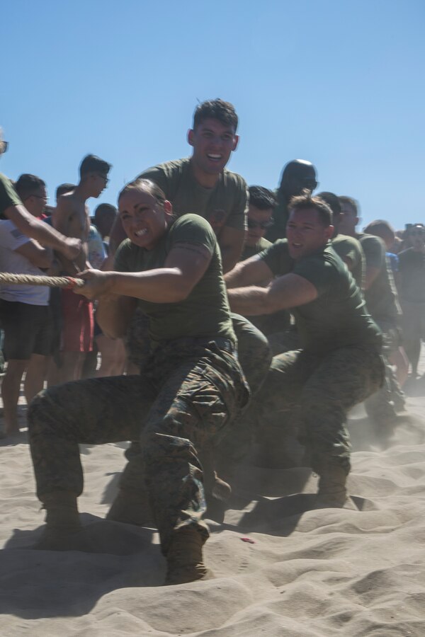 U.S. Marines with Marine Aviation Logistics Squadron 11, Marine Aircraft Group (MAG) 39, 3rd Marine Aircraft Wing, compete in tug-o-war during the MAG-39’s Warrior Games on Marine Corps Base Camp Pendleton, Calif., Oct. 11, 2019. The MAG-39 Warrior Games is a morale building family event that allows the different units in MAG-39 to come together and create comradery amongst one another while also keeping true to their motto ‘Keep Winning’. (U.S. Marine Corps photo by Cpl. Levi J. Guerra)