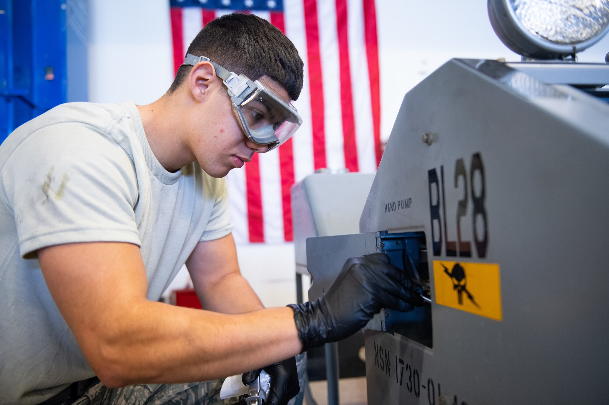 Airman 1st Class Javier Saldana, 388th Aerospace Ground Equipment Flight, performs maintenance on a munitions loader at Hill Air Force Base, Utah, Oct. 4, 2019. Unit Airmen maintain over 600 pieces of equipment that support the mission of crew chiefs, avionics, weapons and ammo troops. (U.S. Air Force photo by R. Nial Bradshaw)