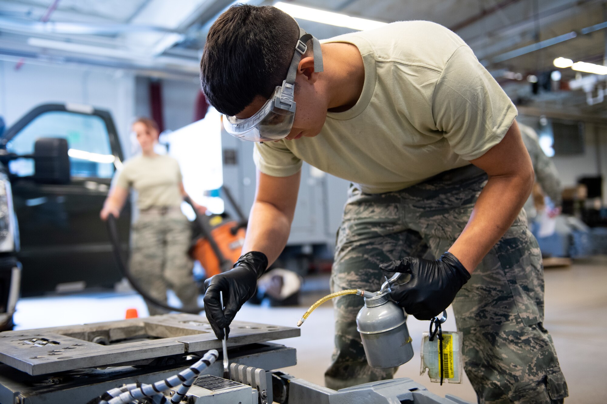 Airman 1st Class Javier Saldana, 388th Aerospace Ground Equipment Flight, performs maintenance on a munitions loader at Hill Air Force Base, Utah, Oct. 4, 2019. Unit Airmen maintain over 600 pieces of equipment that support the mission of crew chiefs, avionics, weapons and ammo troops. (U.S. Air Force photo by R. Nial Bradshaw)