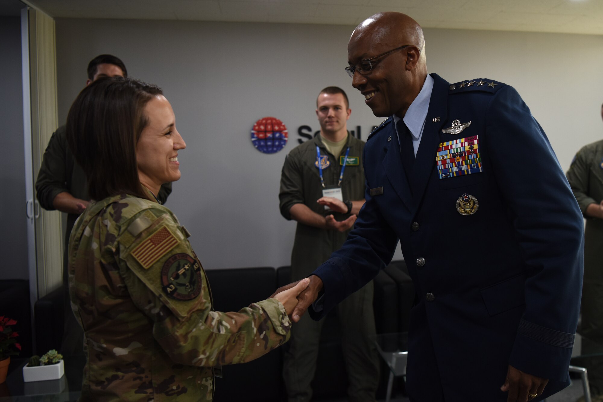 Gen. CQ. Brown, Jr., Pacific Air Forces commander, greets a U.S. Airman during the Seoul International Aerospace and Defense Exhibition 2019 at the Seoul Airport, Republic of Korea, October 16, 2019. Two PACAF Airmen were recognized for their instrumental roles in setting up U.S. participation at Seoul ADEX 2019. (U.S. Air Force photo by Senior Airman Denise M. Jenson)
