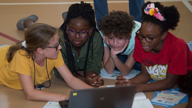MacDill Youth Center members work on a computer science program during the 4-H National Youth Science Day, Oct. 9, 2019, at MacDill Air Force Base, Fla.  The MacDill Youth Center and 4-H team members with Hillsborough County hosted a 4-H National Youth Science Day to introduce MacDill’s youth to computer science and programming. (U.S. Air Force photo by Airman 1st Class Shannon Bowman)