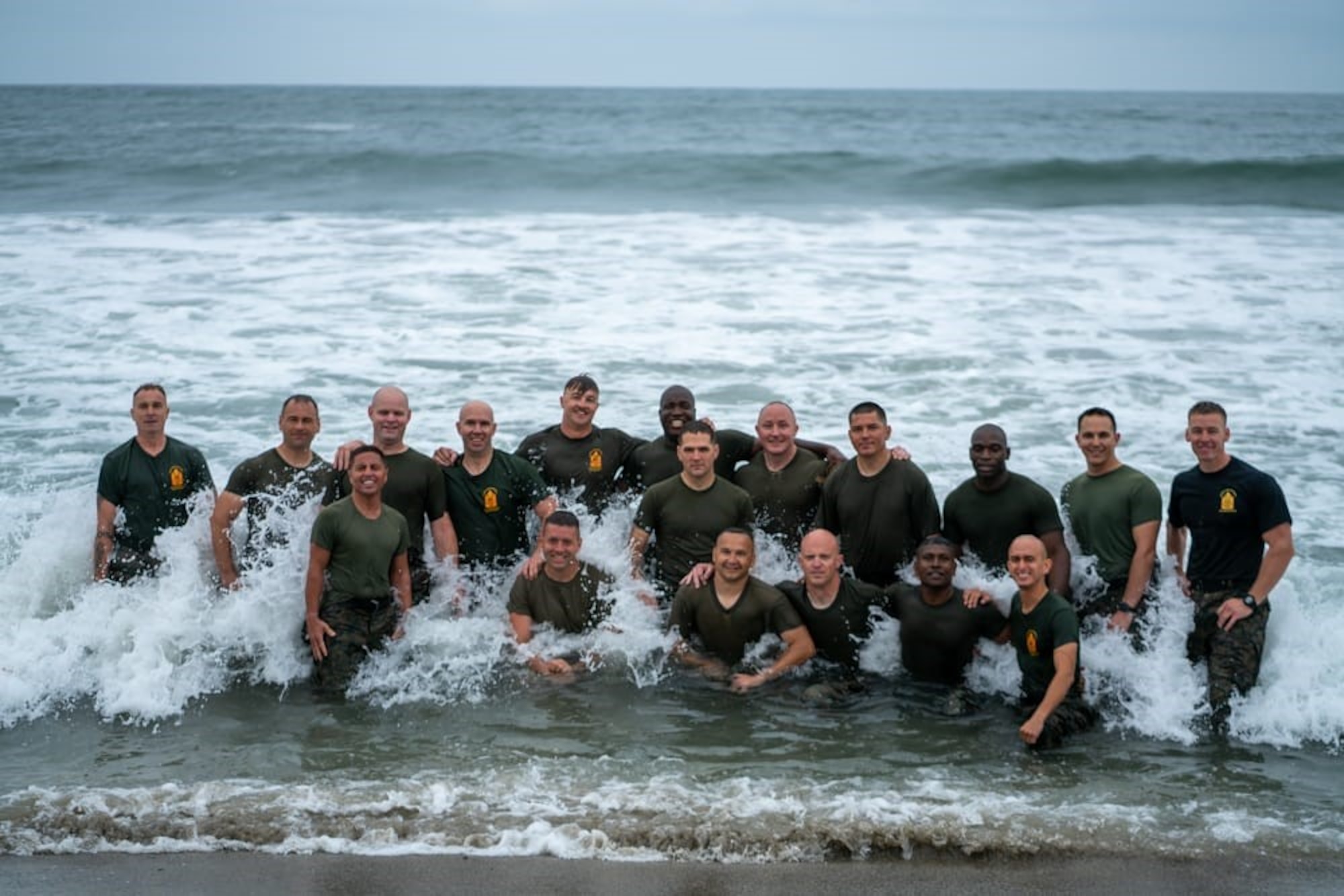 Master Sgt. Paul Willson (kneeling, on left) poses with his group on the San Onofre Beach during the Marine Corps Staff Non-Commissioned Officer Academy at Camp Pendleton, California.