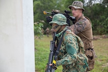 U.S. Marines and soldiers with the Royal Brunei Armed Forces set secuirty