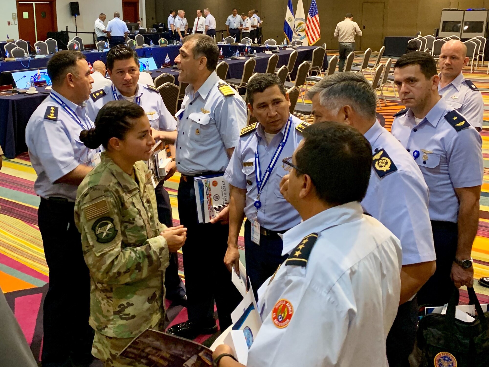 1st Lt. Lorrayne Kealty, 14th Air Support Operations Squadron, Pope Army Air Field, N.C., speaks with Central and South American air force leaders at the Conference of American Air Chiefs in Panama in June 2019. As a Language Enabled Airman Program scholar, Kealty presented at the conference at the encouragement of her squadron commander, Lt. Col. Christopher Sweeny. Conference attendees were pleasantly surprised by Kealty’s mastery of their native language, choosing to listen to her in person instead of relying on interpreters speaking through their earpieces. (Courtesy photo)