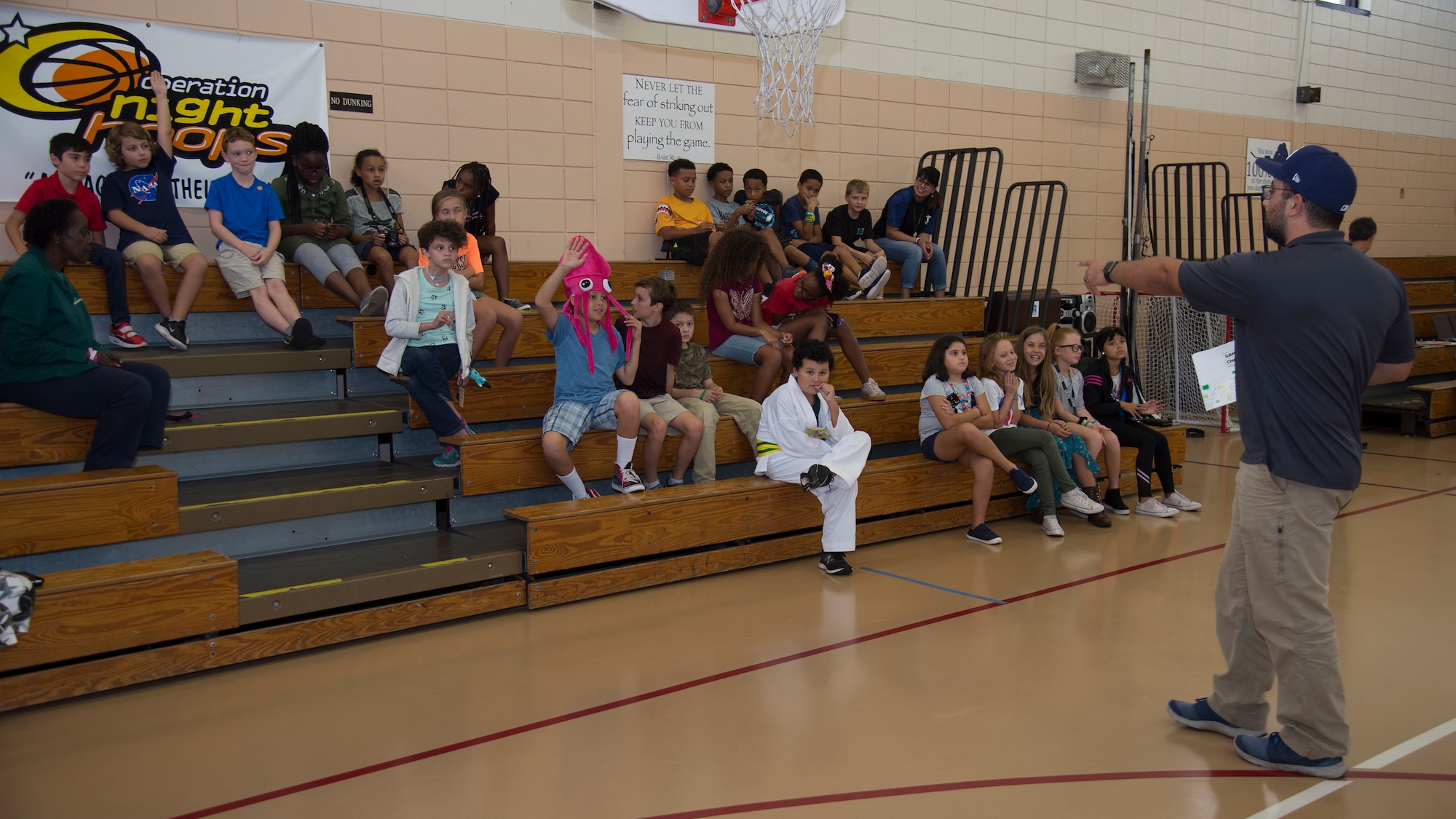 Charles Poliseno, Hillsborough County 4-H youth development extension agent answers questions from MacDill’s Youth Center members, Oct. 9, 2019, at MacDill Air Force Base, Fla. The MacDill Youth Center and 4-H team members with Hillsborough County hosted a 4-H National Youth Science Day to introduce MacDill’s youth to computer science and programming. (U.S. Air Force photo by Airman 1st Class Shannon Bowman)