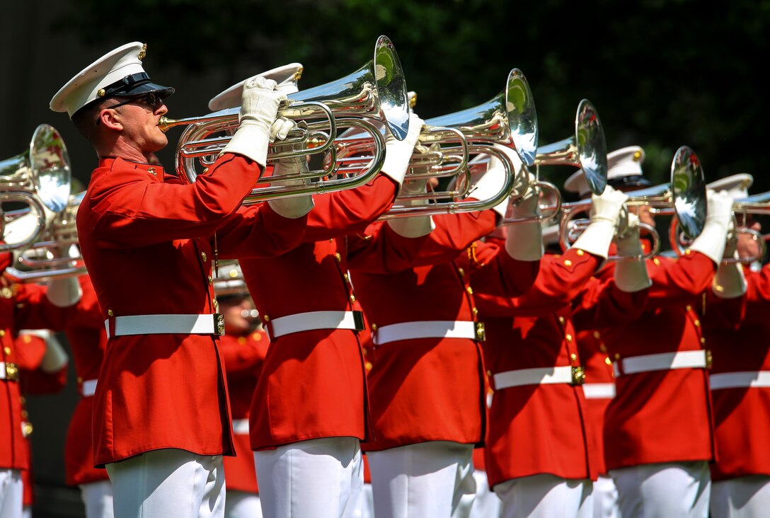 Marines with “The Commandant’s Own,” the U.S. Marine Drum & Bugle Corps perform as part of the New York Fleet Week 2017 tour at the 9/11 Memorial in N.Y.C., May 28, 2017. The BCD is comprised of the Marine Corps Silent Drill Platoon, “The Commandant’s Own,” the U.S. Marine Drum & Bugle Corps, and the Marine Corps Color Guard. The Marines of this highly skilled unit traveled to N.Y. to demonstrate the discipline, professionalism, and “Esprit de Corps” of Marines. (Official U.S. Marine Corps photo by Lance Cpl. Damon Mclean/Released)
