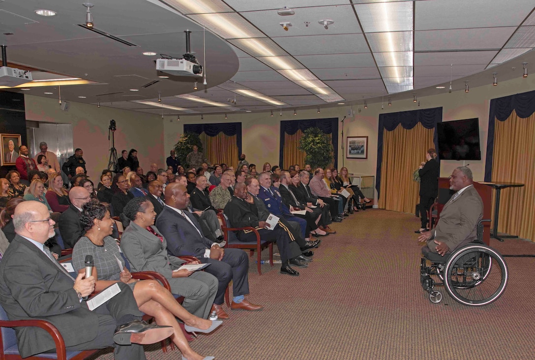 Retired Army Col. Gregory D. Gadson, a bilateral above-the-knee amputee, speaks to DLA employees.