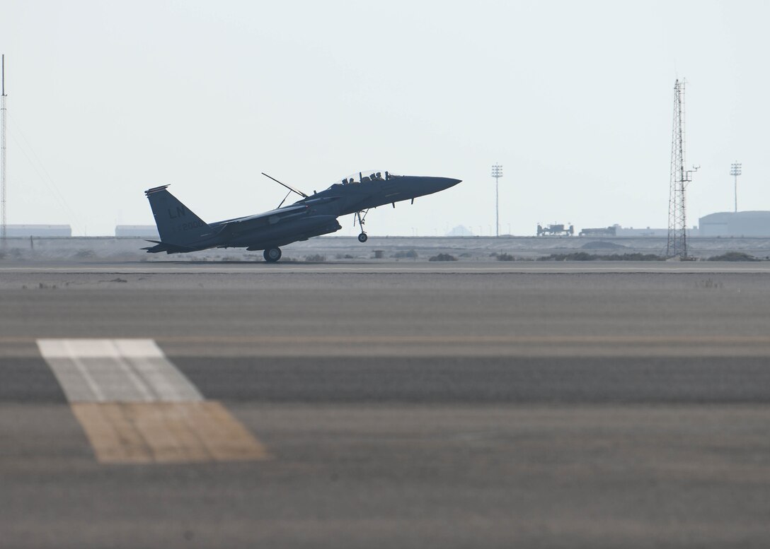 A U.S. Air Force F-15E Strike Eagle from the 494th Fighter Squadron lands at Al Dhafra Air Base, United Arab Emirates, Oct. 18, 2019.