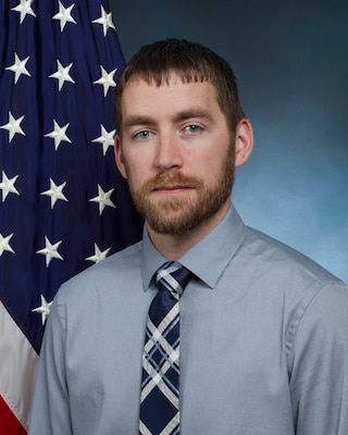 official photo with American flag in background