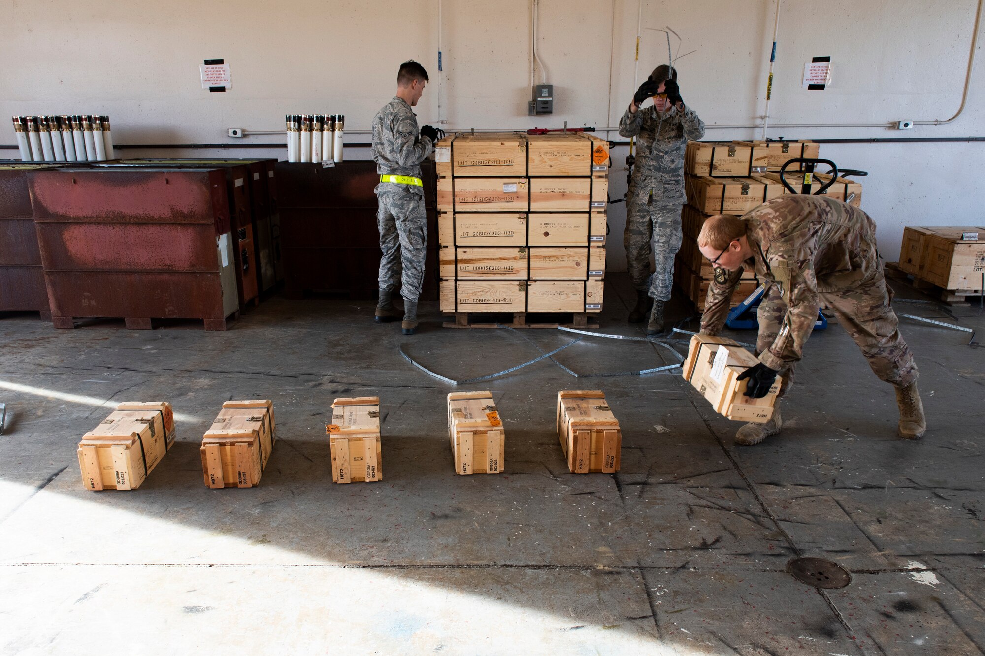 Airmen assigned to the 23d Maintenance Squadron prepare munitions for assembly Oct. 17, 2019, at Moody Air Force Base, Ga. The Munitions Flight Production Division is responsible for maintaining, inspecting, producing and delivering ammo to Moody’s munitions holding area. Following technical orders for operations and procedures allow the Airmen to minimize errors in their stock of over 52 million munitions, ensuring the fighter squadrons are prepared for future operations. (U.S. Air Force photo by Airman Elijah M. Dority)